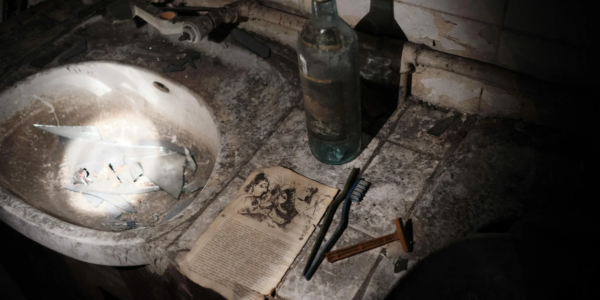 Decrepit washing sink inside former communication bunker