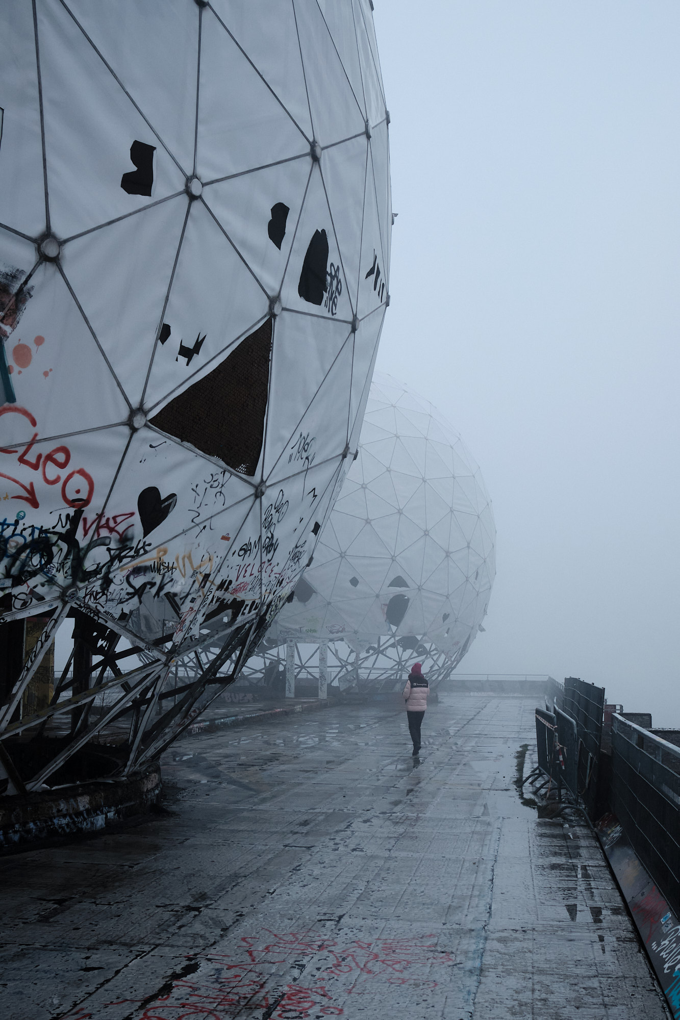 Decrepit radomes of Berlin Field Station in fog